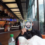 Elliott in a Dunkin Donuts, Potsdamer Platz, Berlin. Photo by Scarlett Messenger